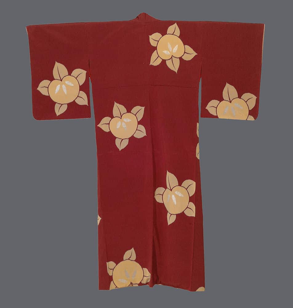 Red Japanese kimono with yellow flower pattern, traditional design