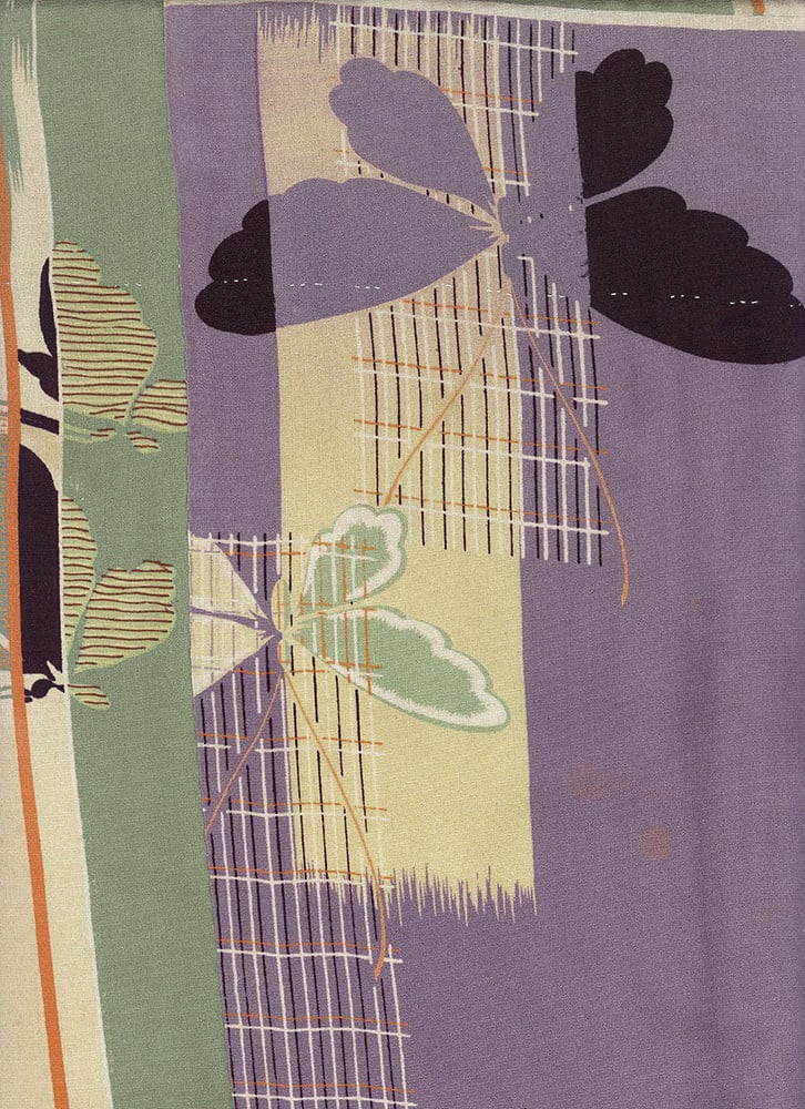 Abstract geometric textile design with overlapping leaf-like shapes