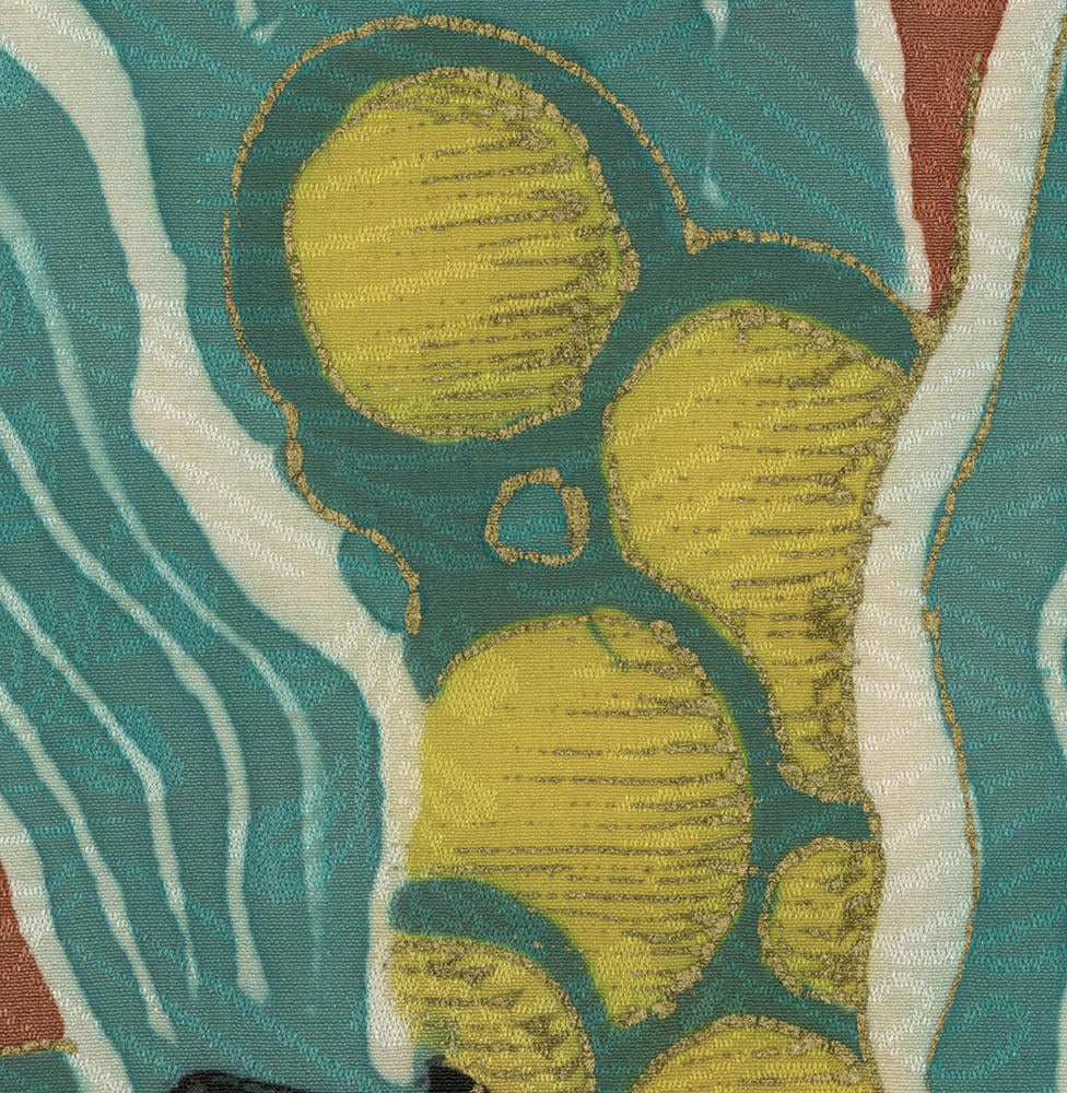 Abstract fabric with yellow textured circles on teal and white background