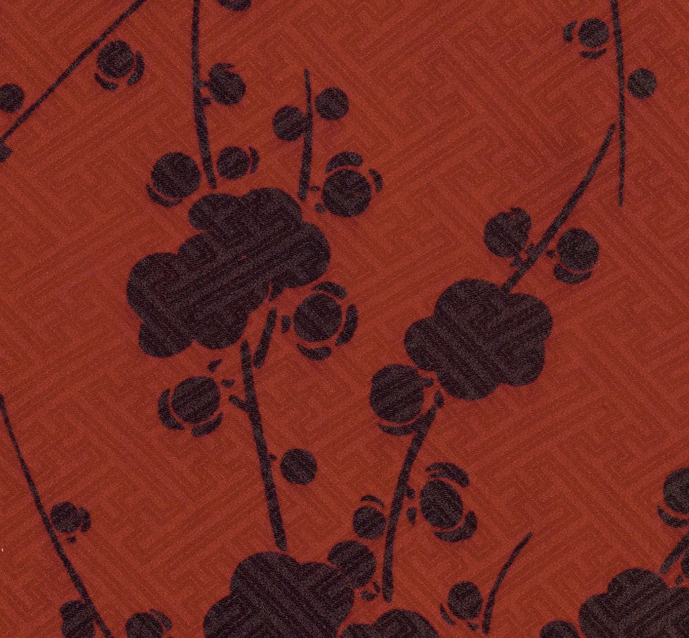 Black floral pattern with circular nodes on rust-colored textured background