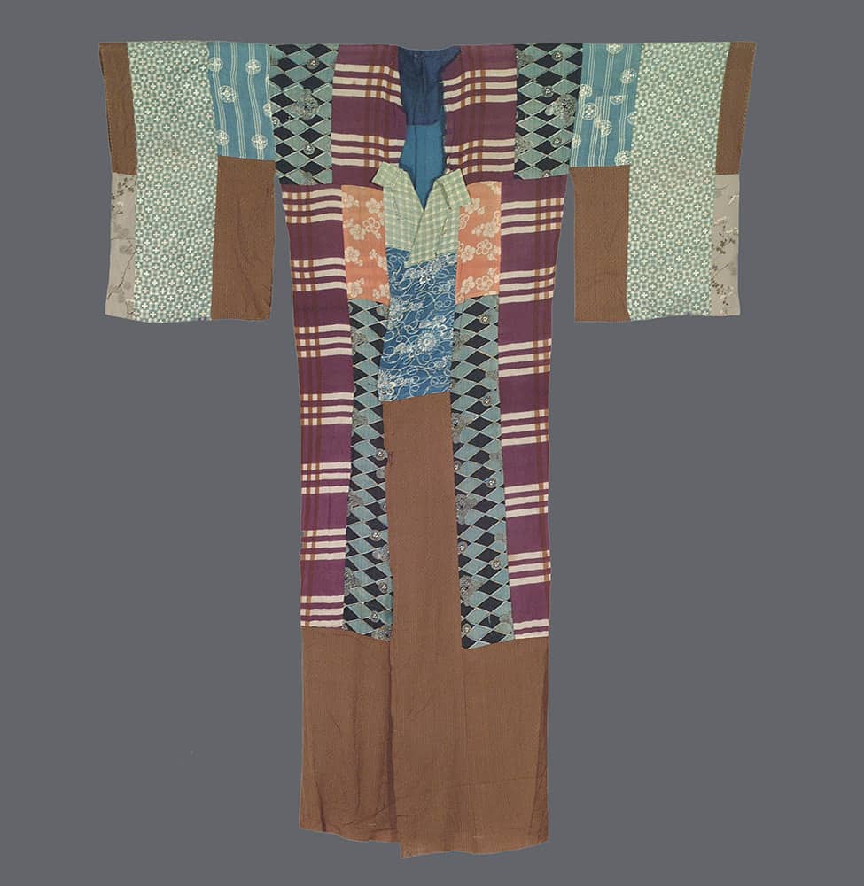 Vintage Japanese kimono with patchwork design in purple, blue, and brown
