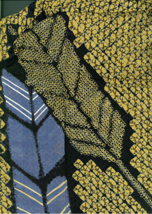 Stylized leaf pattern in yellow, blue, and green with geometric texture