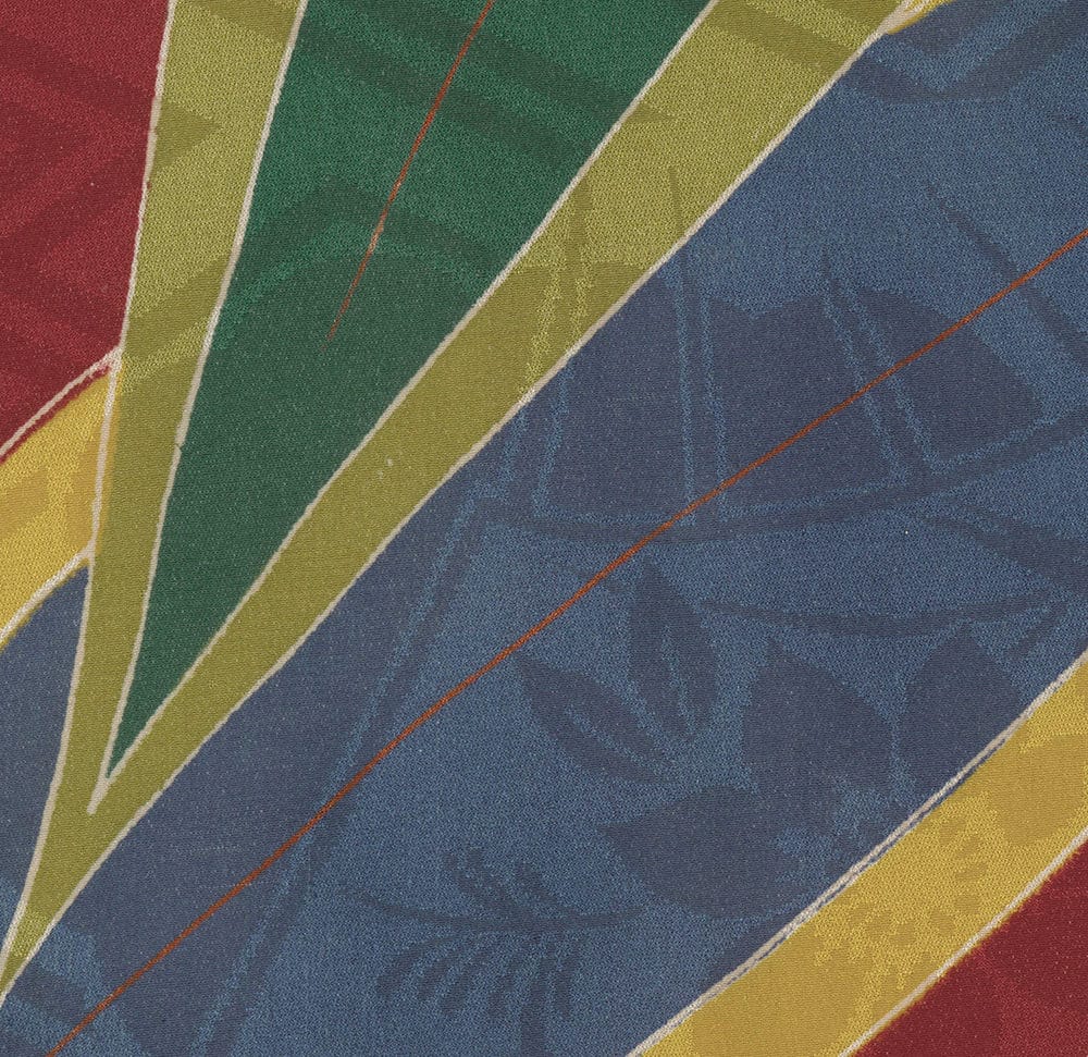 Diagonal striped fabric with blue, green, yellow, and red colors