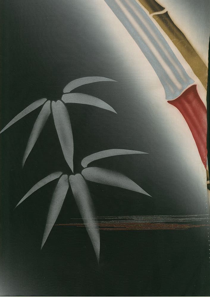 Stylized bamboo leaves in grayscale with subtle color accents