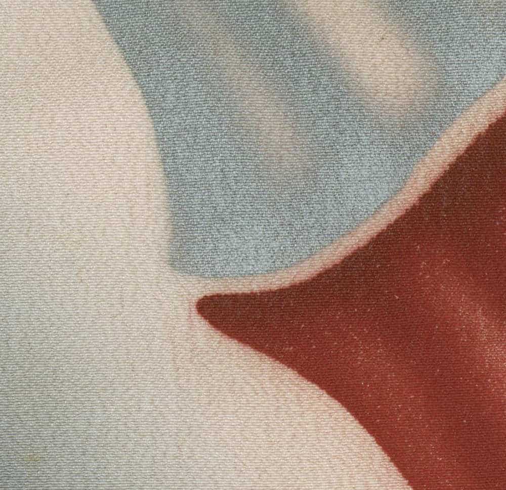 Abstract geometric textile with soft blue, beige, and rust-colored shapes