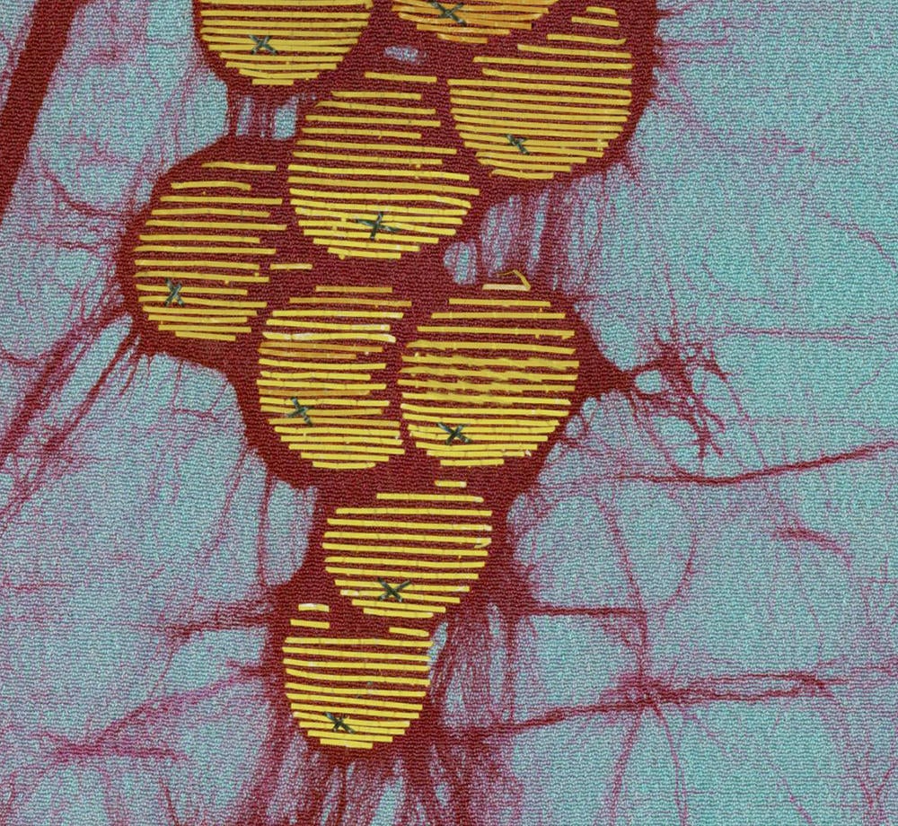 Yellow striped organic shapes with small crosses on red and blue background