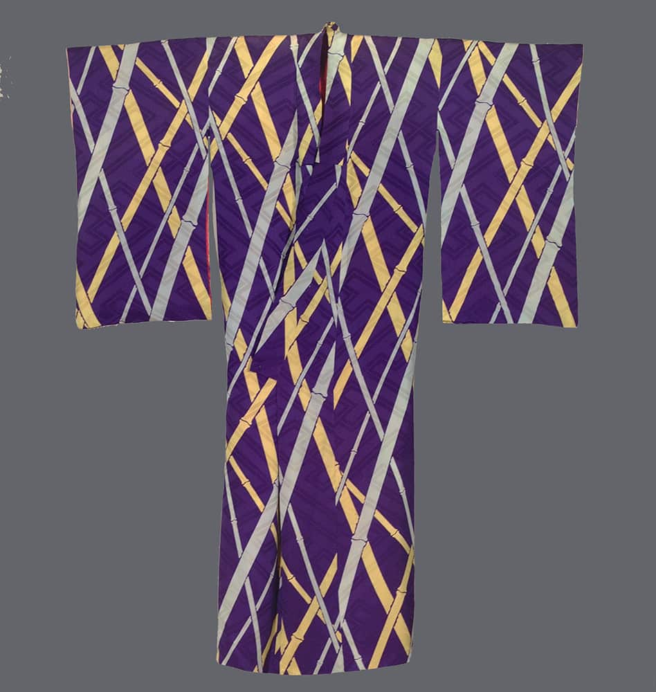 Traditional Japanese kimono with purple background and yellow-silver geometric lattice pattern