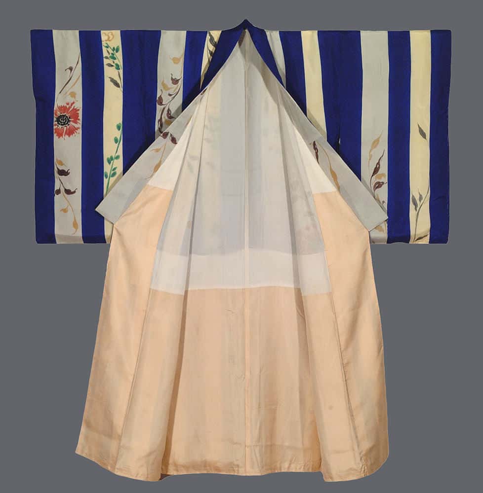 Traditional Japanese kimono with blue and white striped sleeves and peach body