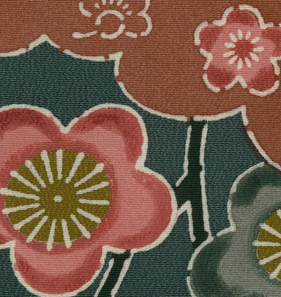 Vintage floral textile with stylized flowers in green, pink, and brown