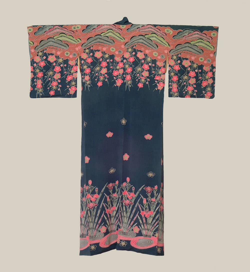 Vintage Japanese kimono with floral pattern in pink, green, and dark blue