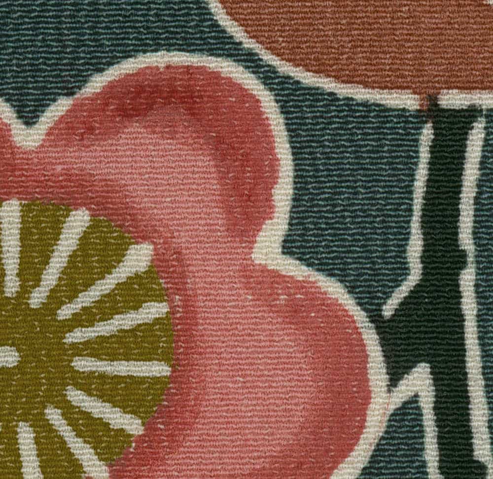 Abstract carpet texture with red circles, green sunburst, and geometric shapes