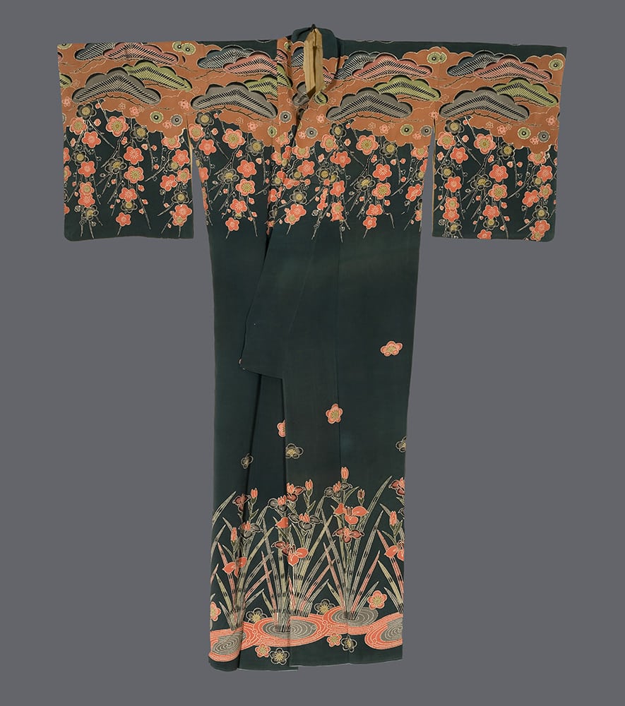 Traditional Japanese kimono with floral pattern in orange and green