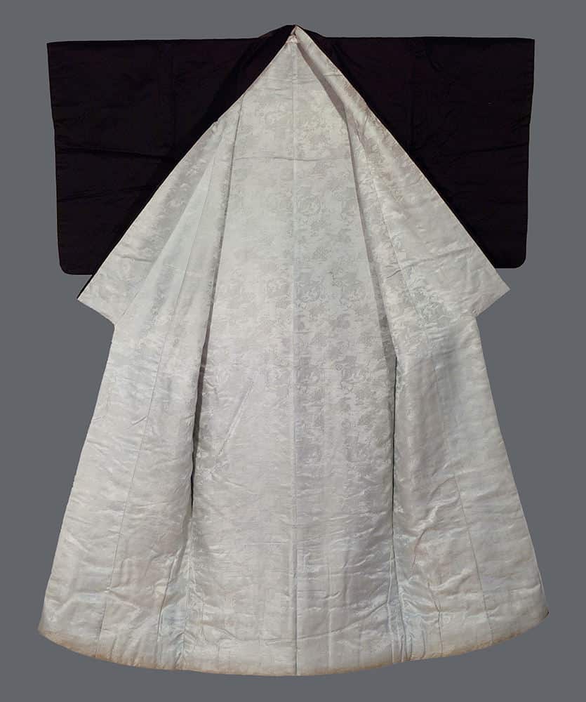 Elegant white and black Japanese kimono with subtle floral pattern