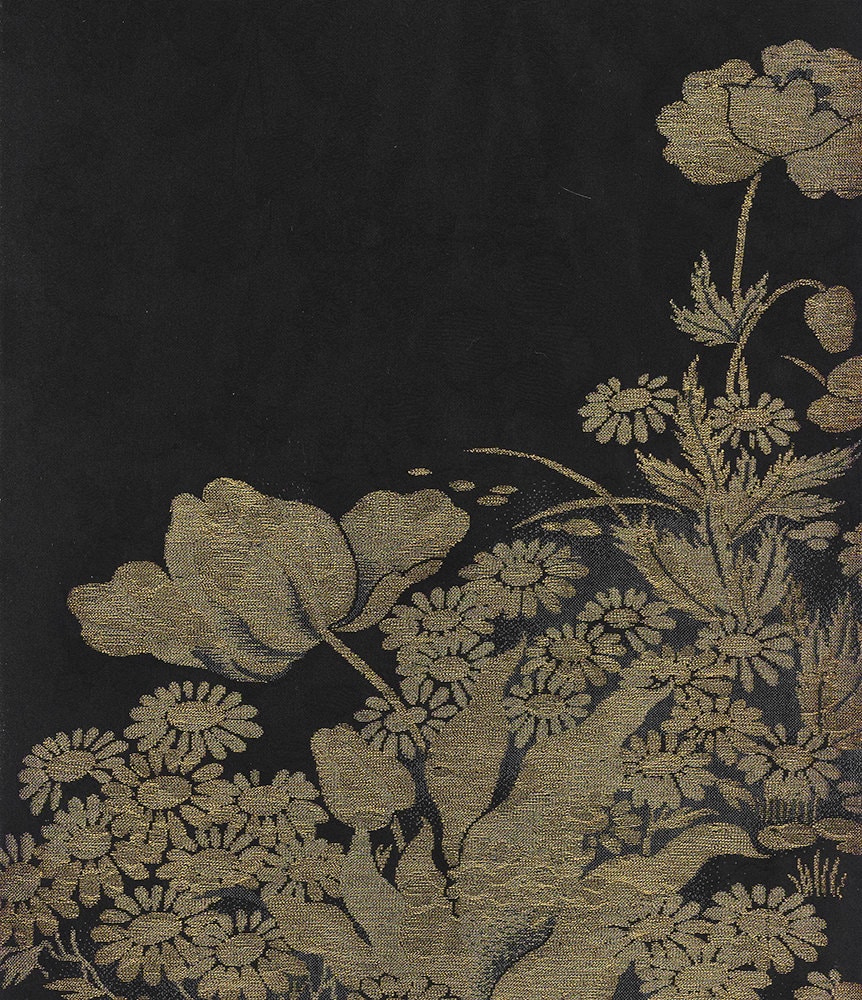 Golden floral tapestry with intricate botanical design on dark background