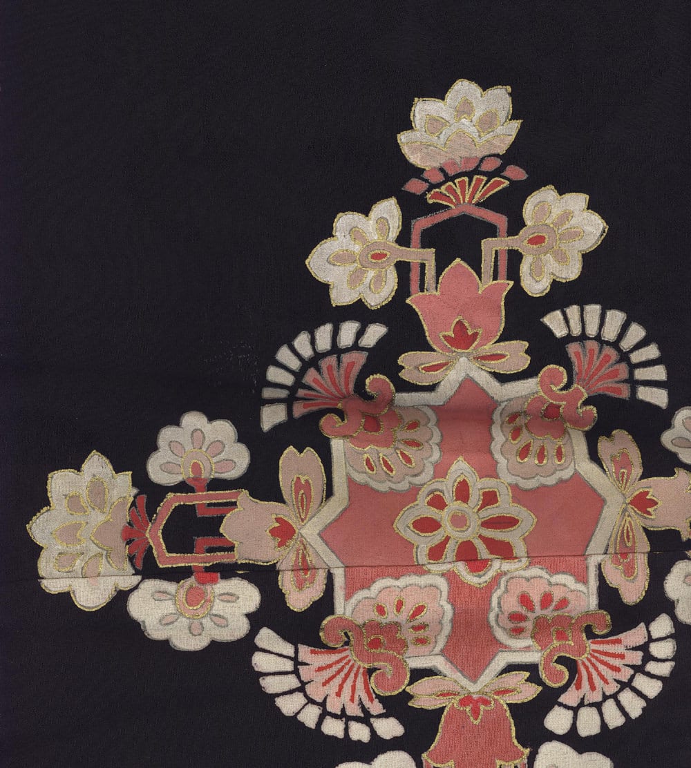 Vintage floral textile design with pink, white, and gold embroidery