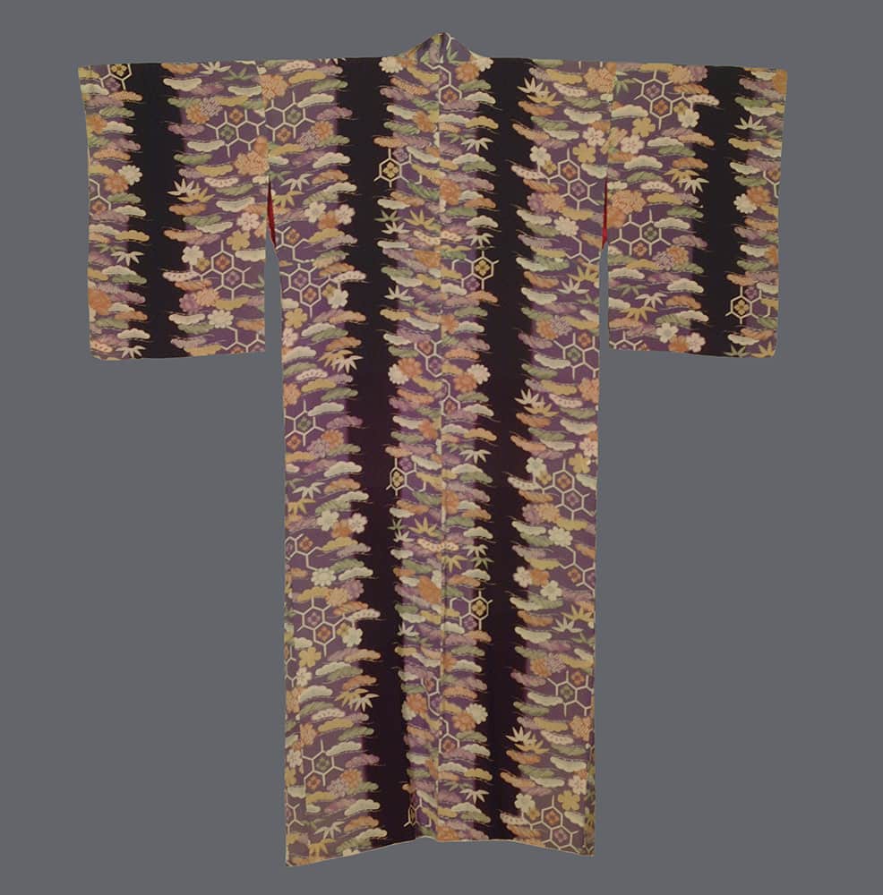 Ornate Japanese kimono with floral patterns and hexagonal geometric design