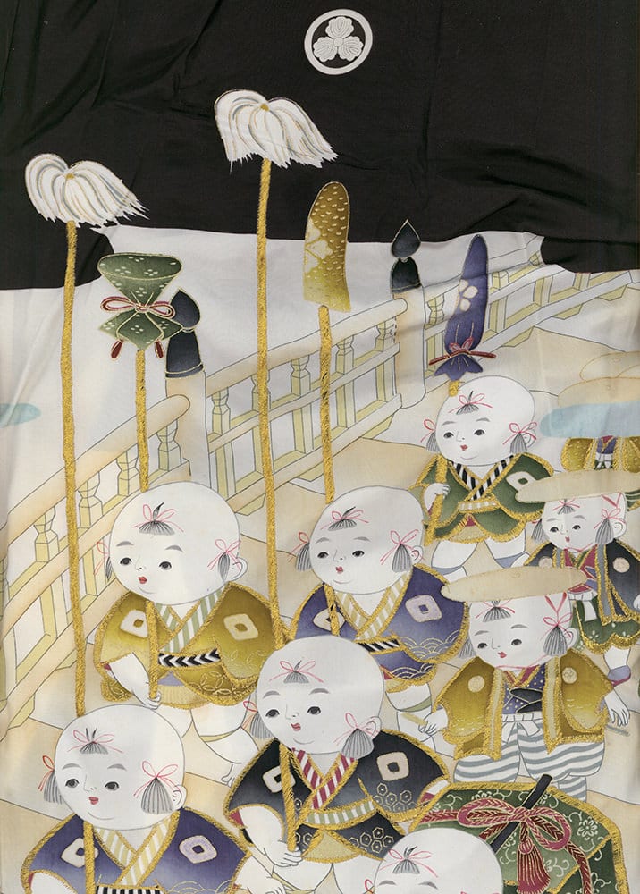 Traditional Japanese art of cute round dolls with decorative kimonos