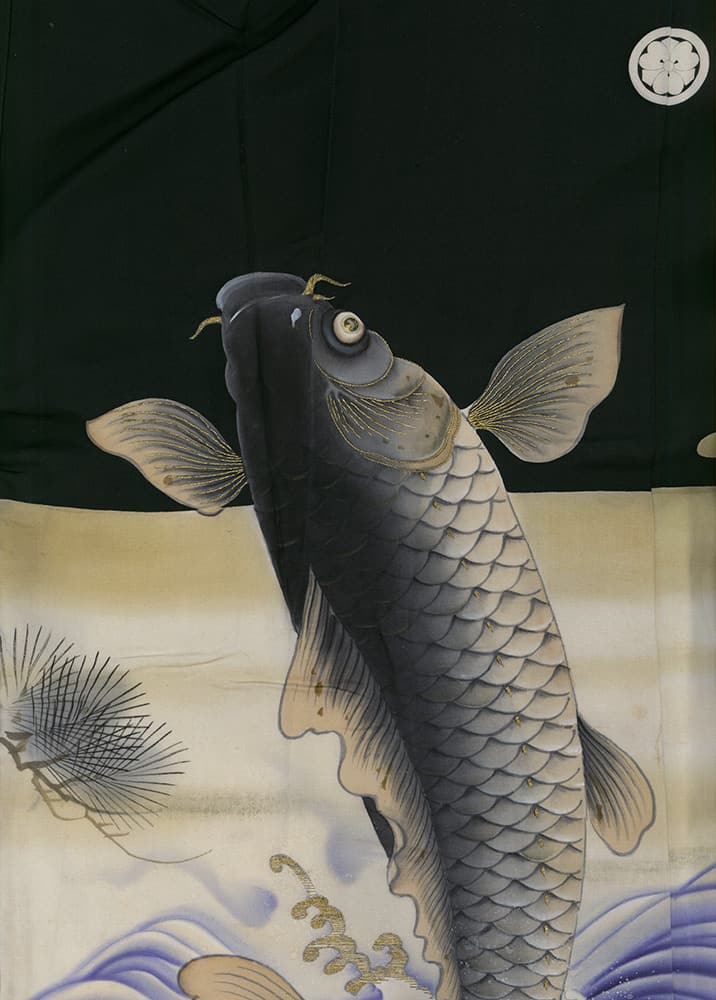 Detailed Japanese artwork of a leaping grey koi fish with scaled body