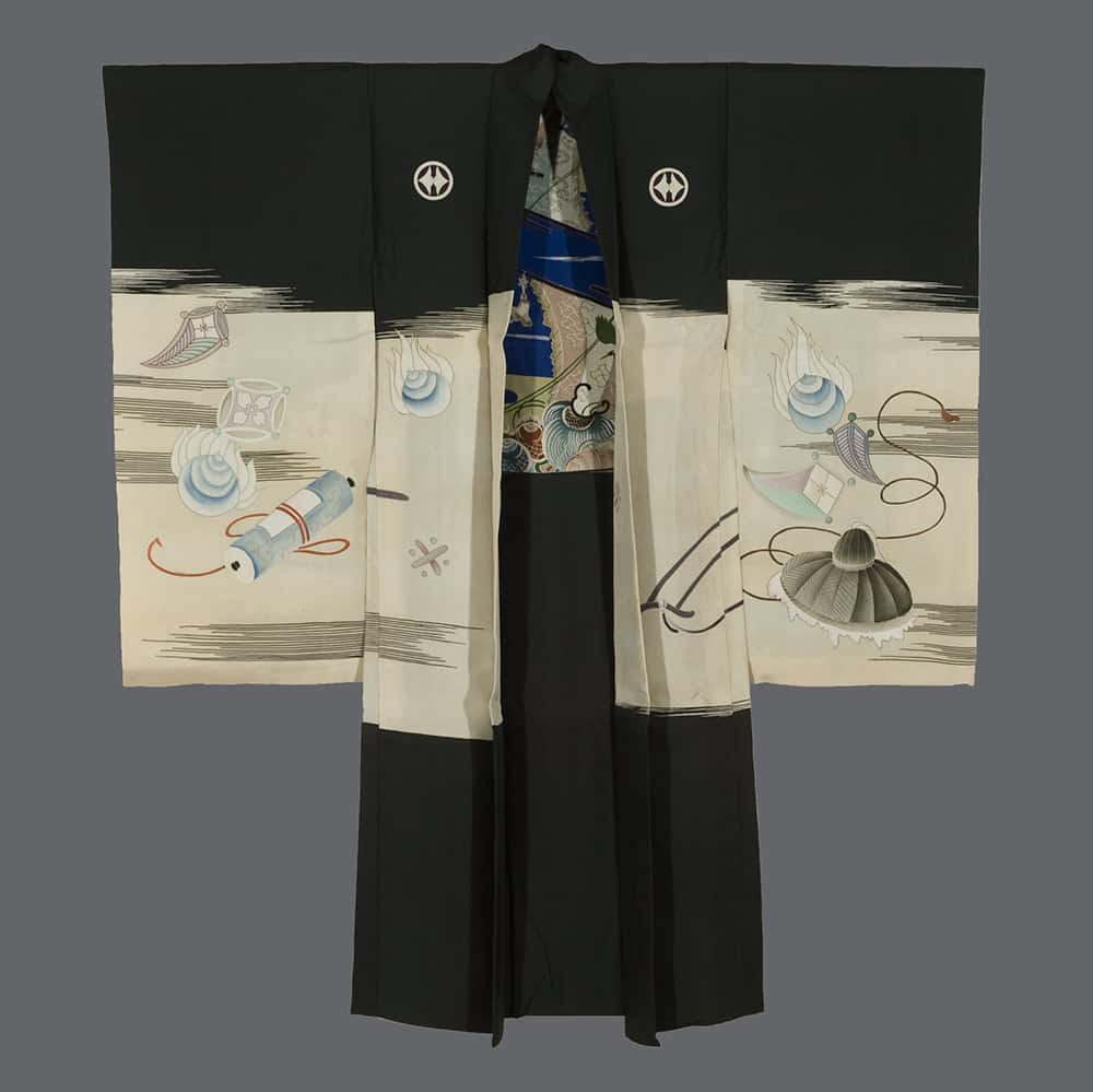 Traditional black and white Japanese kimono with delicate artistic design elements