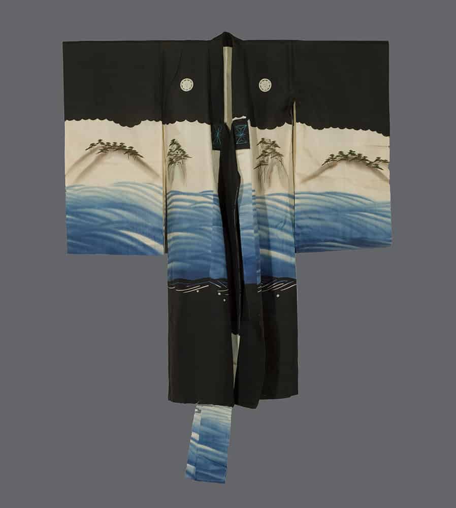 Traditional Japanese kimono with seascape design in black, blue, and white