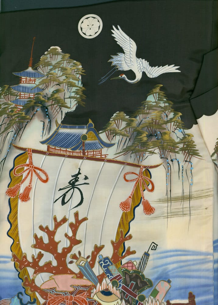 Japanese crane flying over traditional pagoda and coastal landscape
