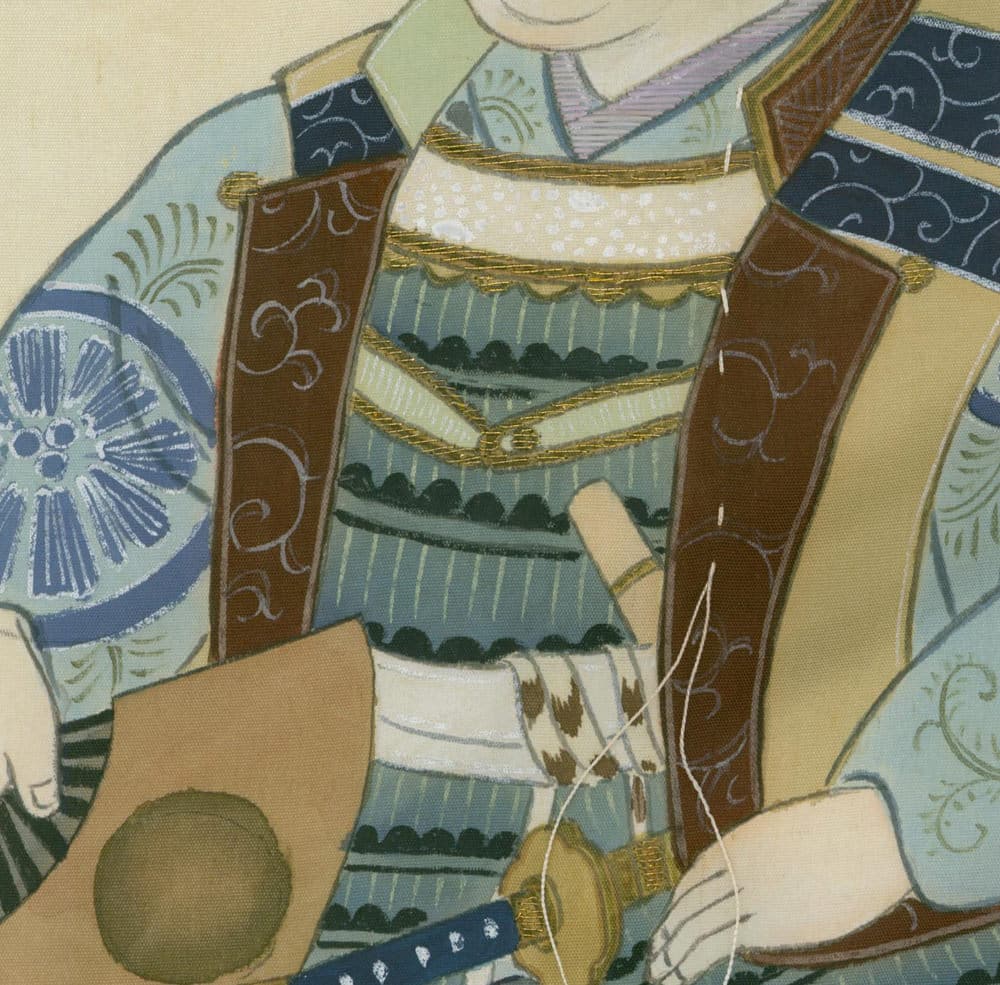 Detailed Japanese textile artwork with ornate patterns and gold embellishments