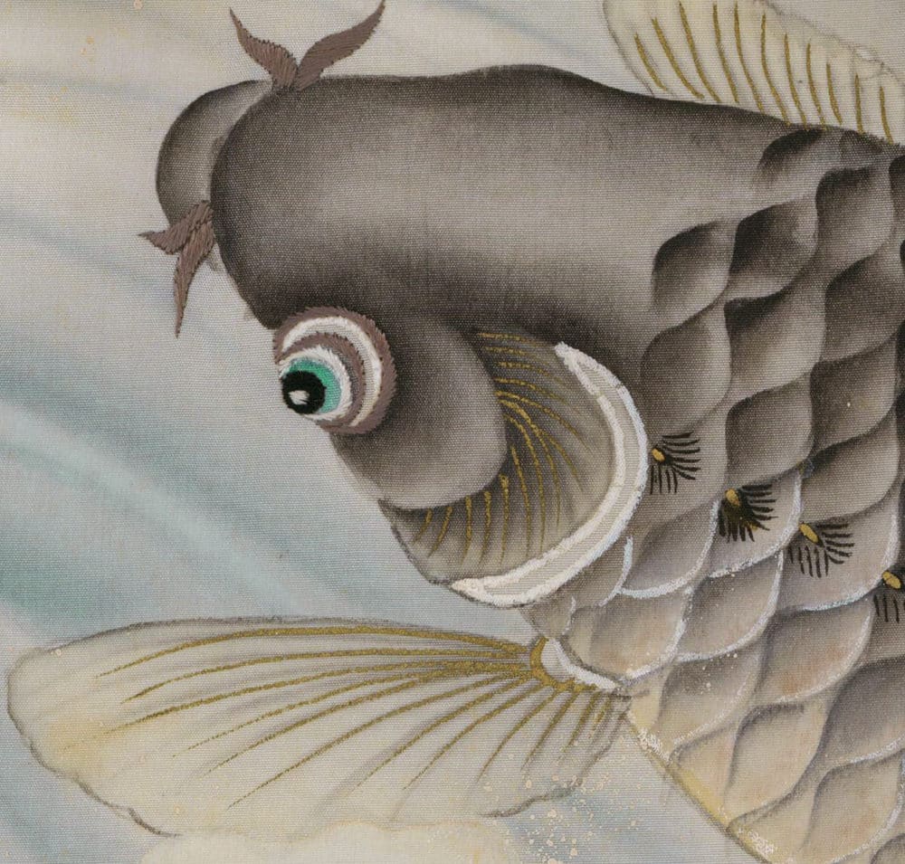 Detailed illustration of a fish with textured scales and vivid green eye