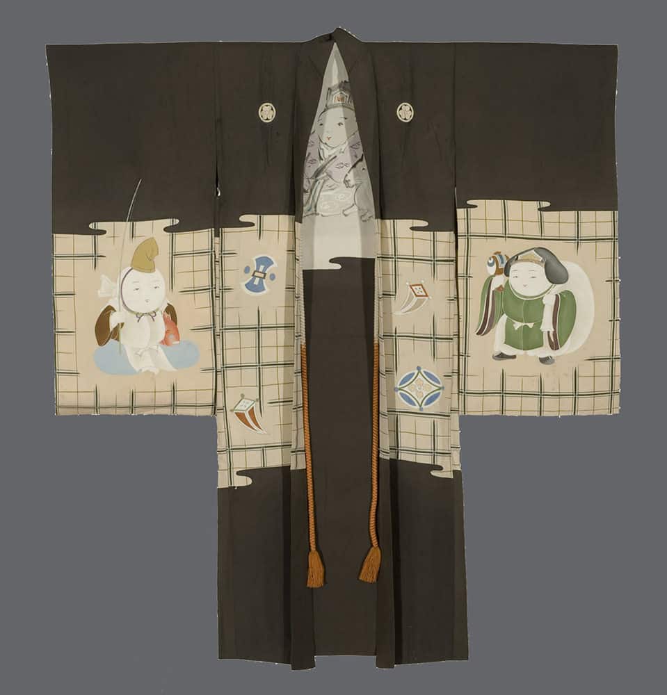 Traditional Japanese kimono with whimsical figures and geometric patterns