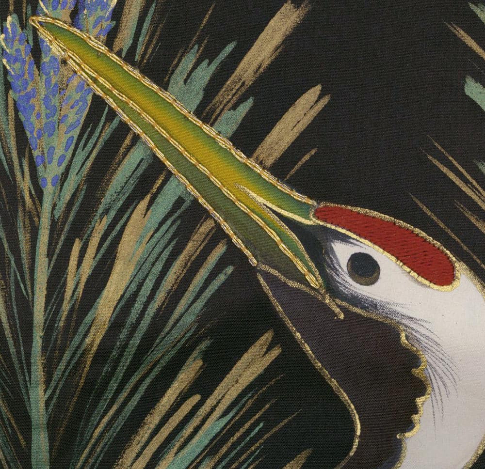 Closeup of bird with elongated green feather and blue botanical detail