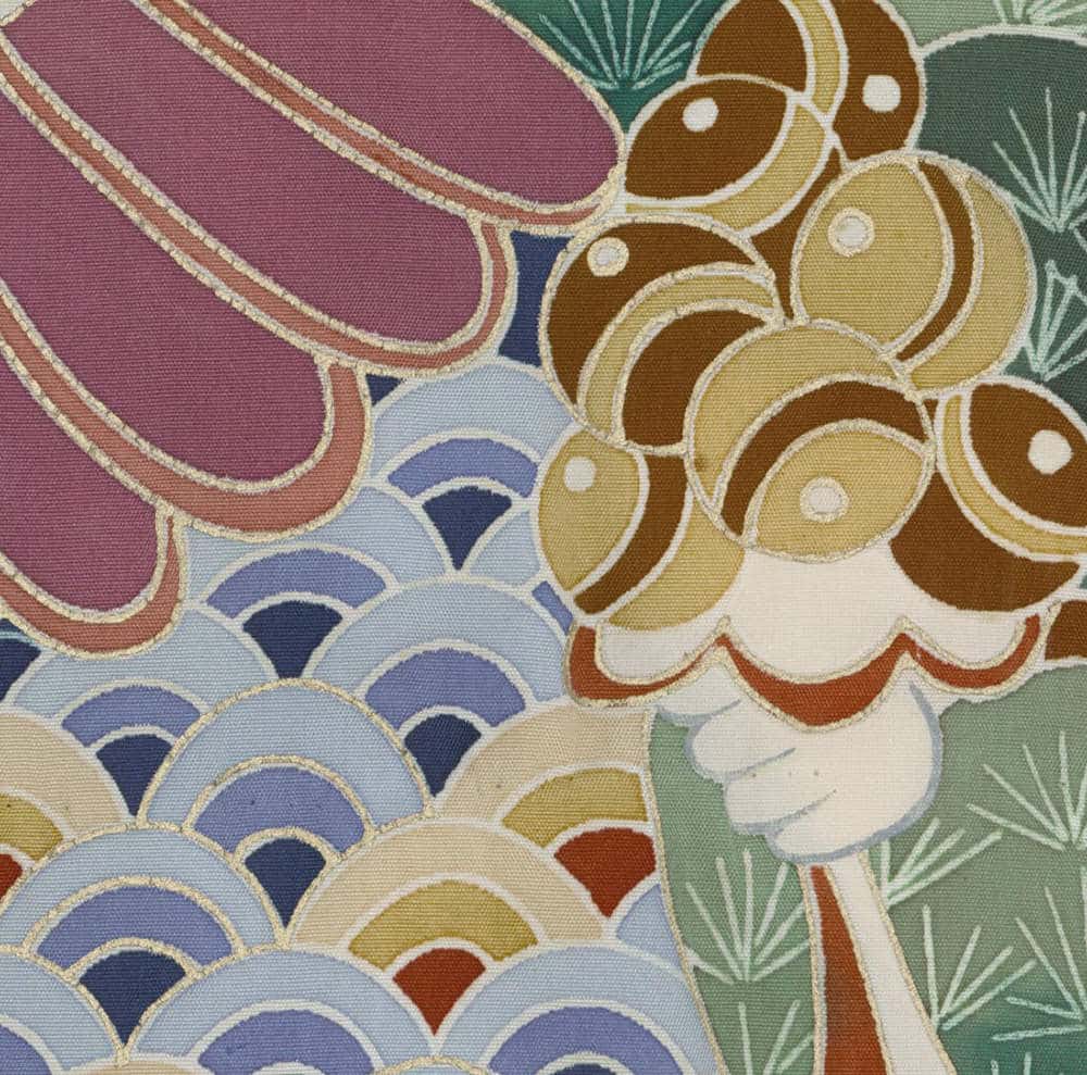 Colorful abstract fabric with fish-like shapes and wave patterns