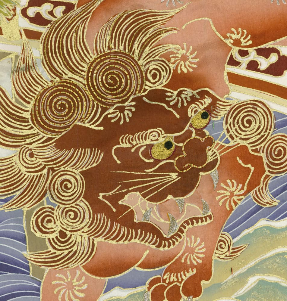 Intricate Asian-style illustration of stylized dragon with golden spirals