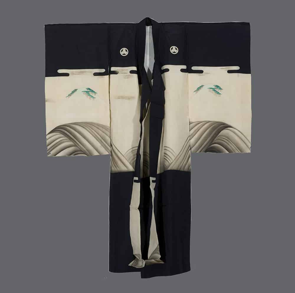 Traditional black and white Japanese kimono with wave pattern