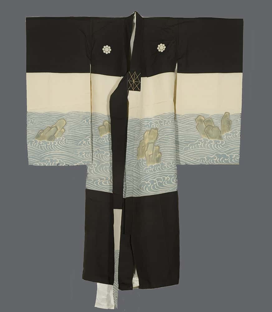 Traditional Japanese black and white kimono with ocean waves design