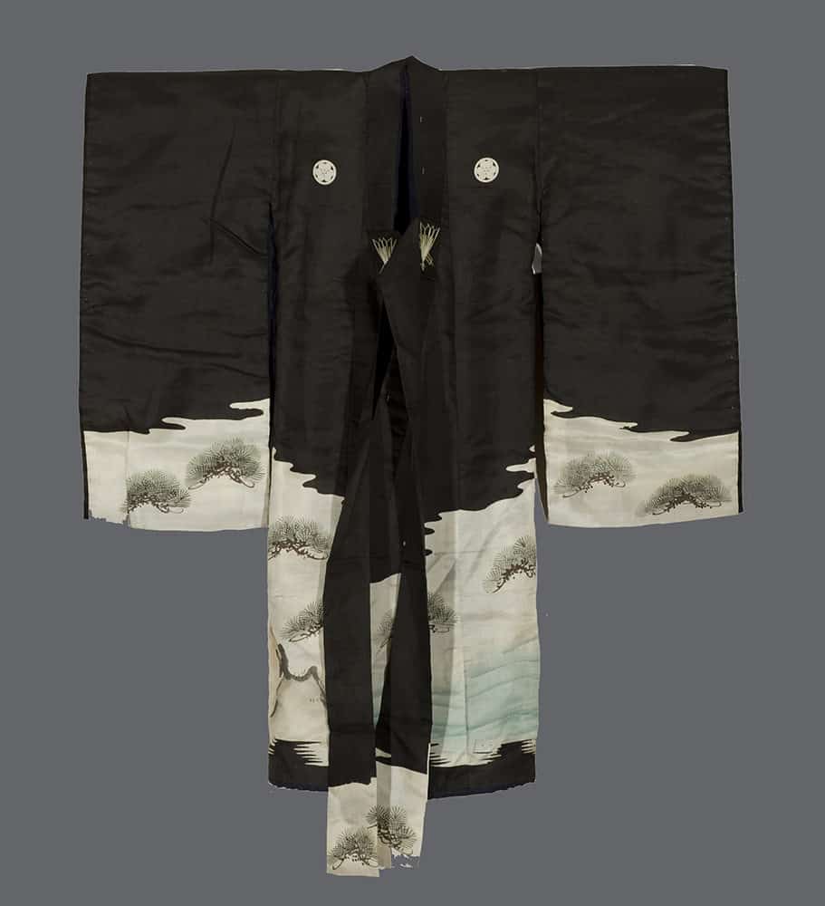 Black and white Japanese kimono with pine tree design on sleeves