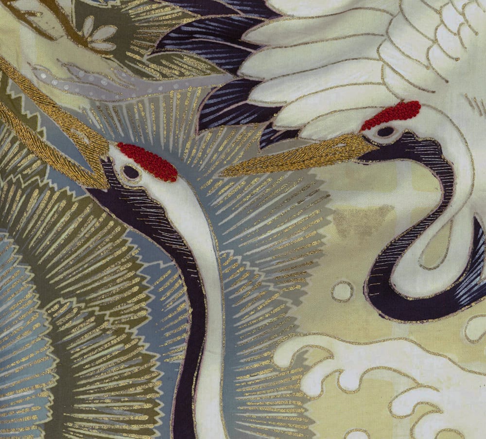 Elegant cranes with red crests in traditional Japanese textile artwork