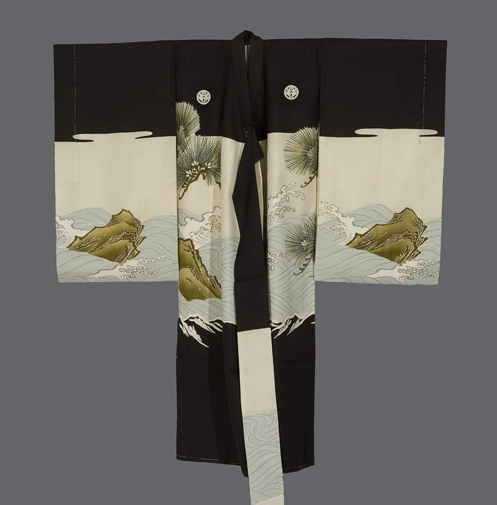 Traditional black and white Japanese kimono with mountain and wave design