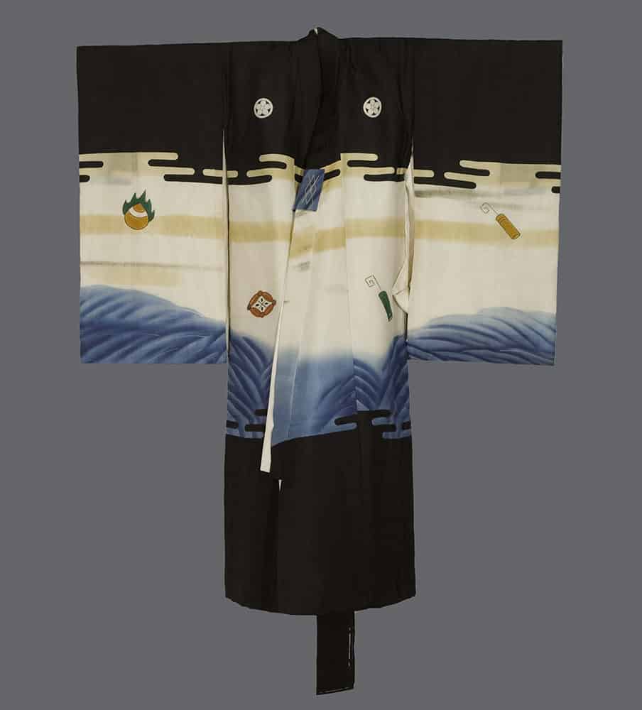 Traditional Japanese black and white kimono with blue wave pattern