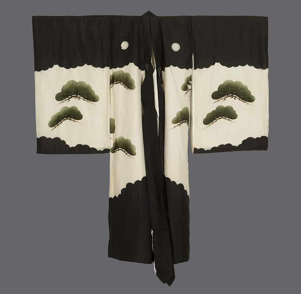 Black and white Japanese kimono with green pine tree design