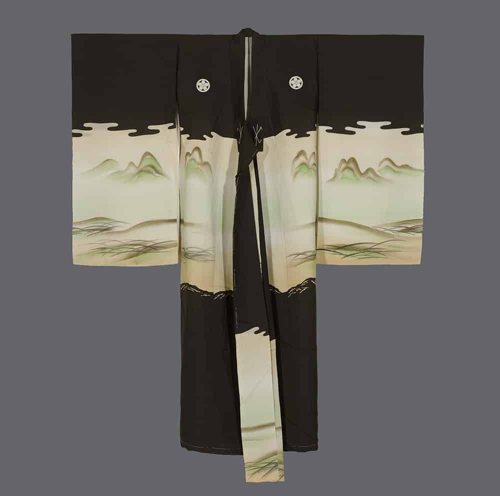 Traditional black and white Japanese kimono with landscape painting design