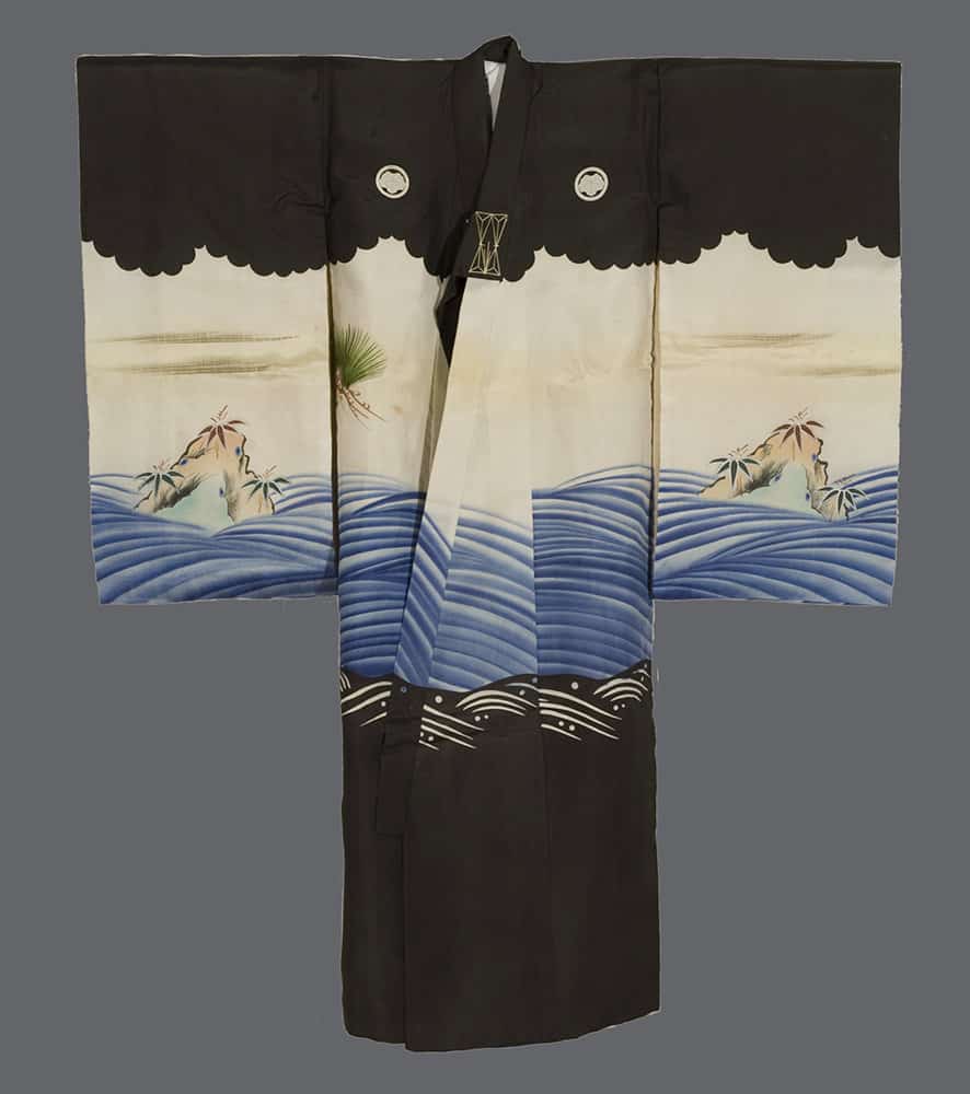 Traditional black and white Japanese kimono with blue waves and bamboo