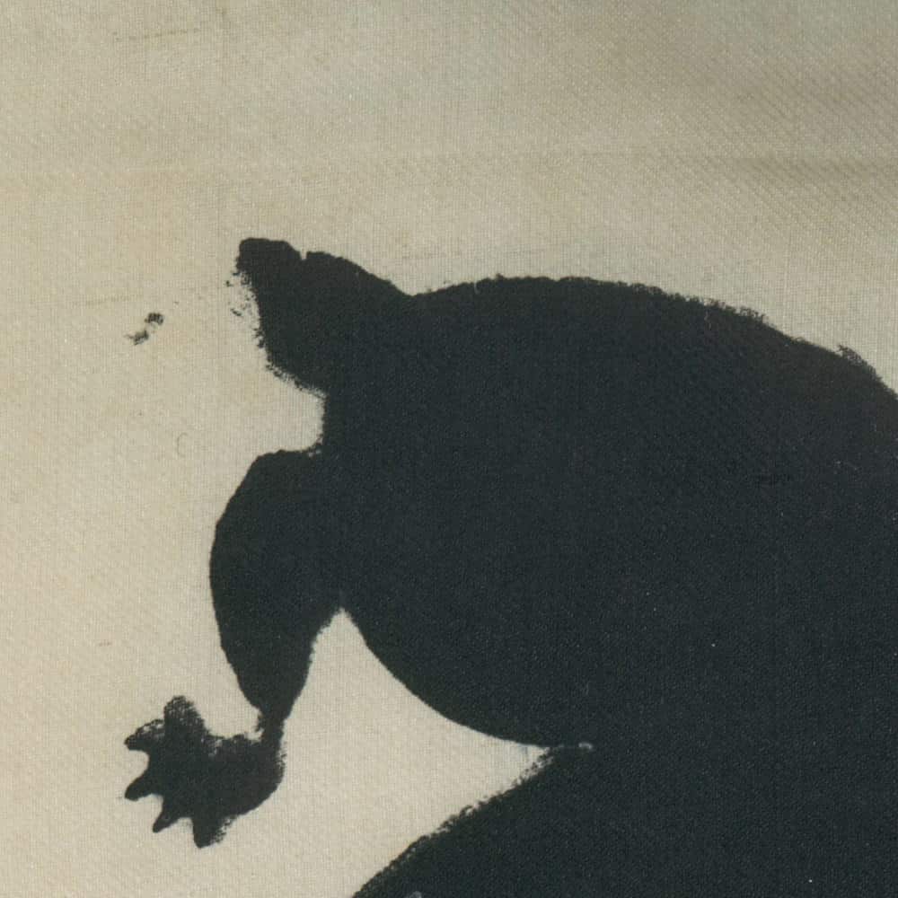 Black silhouette of a rooster on a light background