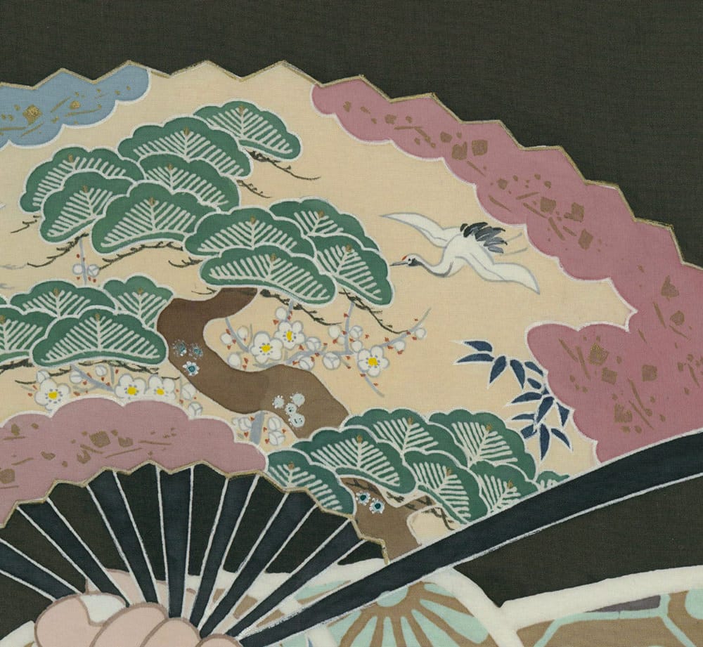 Japanese folding fan with pine trees, flowers, crane, and pastel landscape