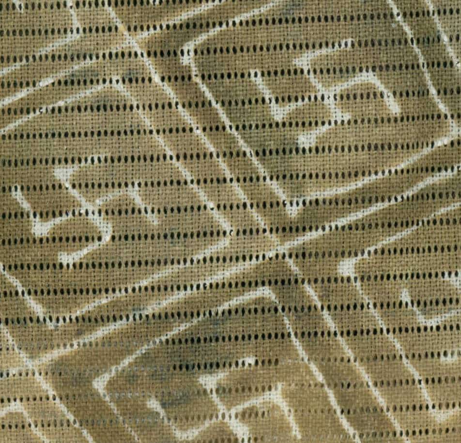 Textured beige fabric with geometric white and black dotted lines