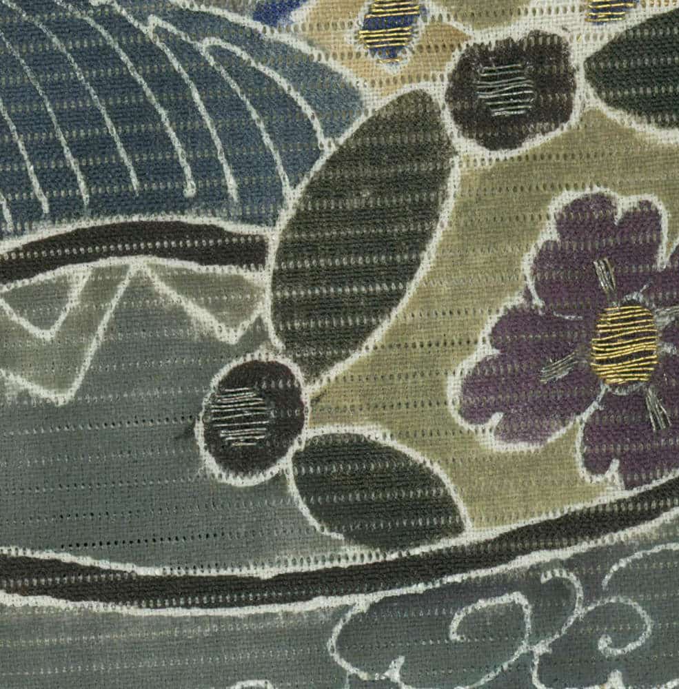 Textured fabric with abstract floral pattern in muted gray, green, and purple colors