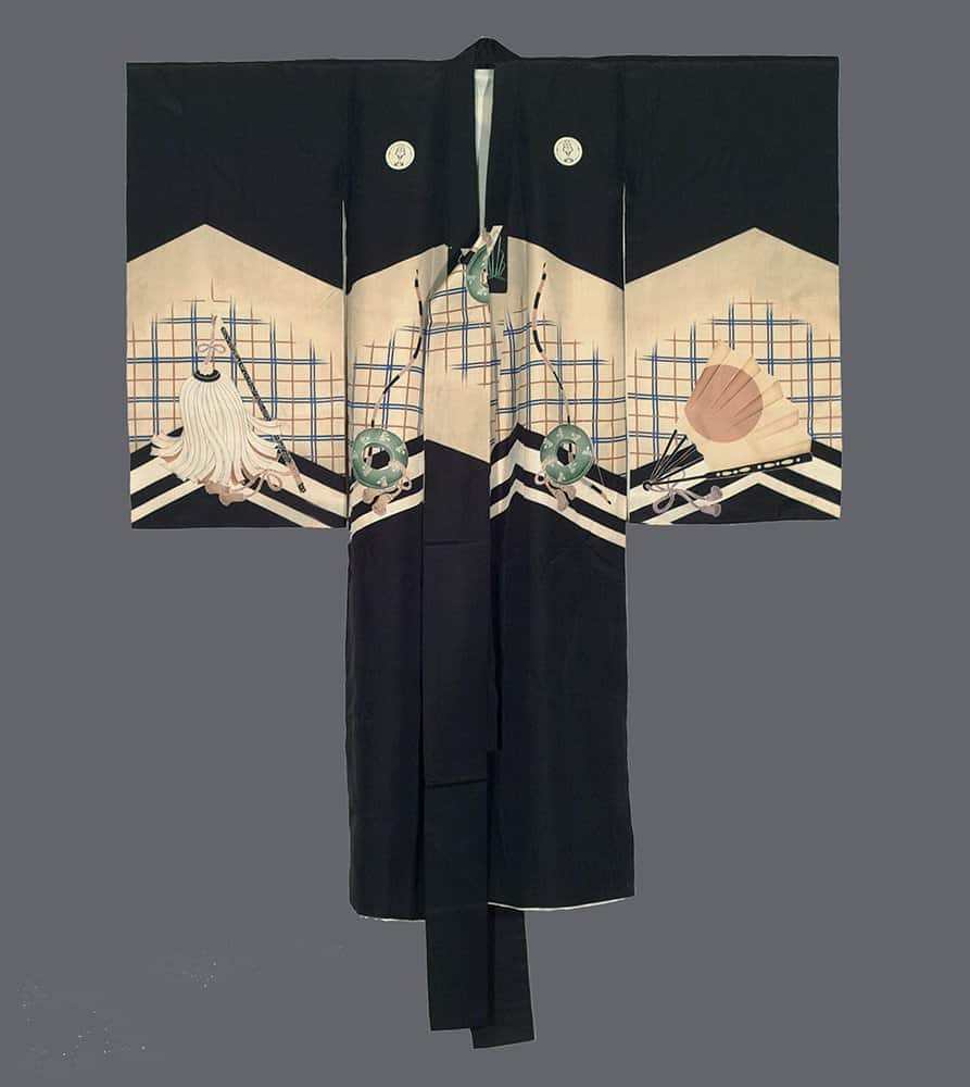 Traditional black Japanese kimono with decorative geometric patterns and objects