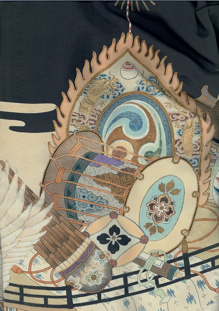 Intricate Japanese art with decorative patterns, drums, and floral motifs