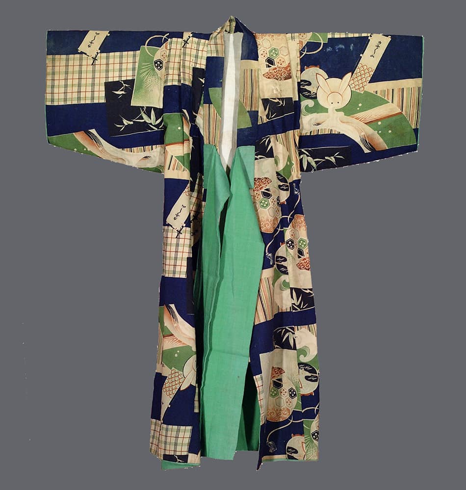 Traditional Japanese kimono with patchwork design in green, blue, and beige