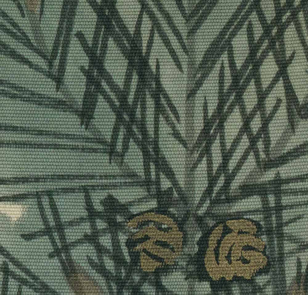 Green fabric with leaf pattern and golden brown floral design