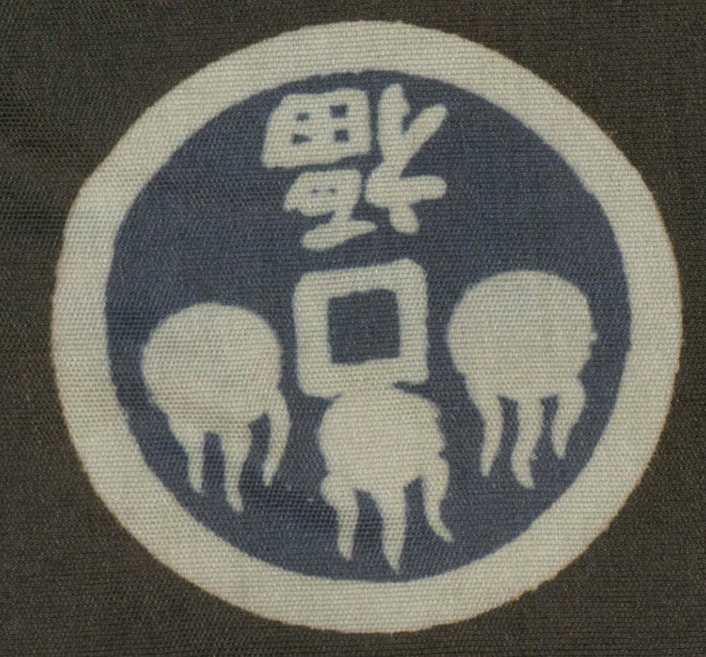 Stylized robot or computer character with raised arms on circular badge