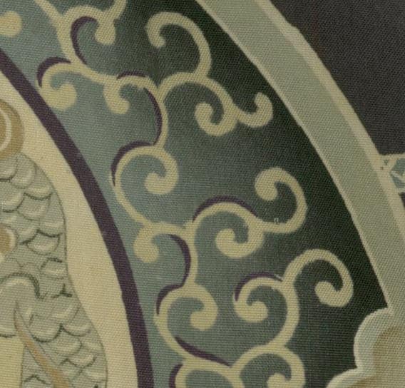 Intricate curving swirls in muted green, beige, and purple tones